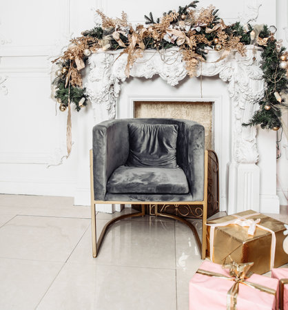 beautiful big Christmas tree decorated with balls and toys holiday christmas mood gifts with ribbons.の写真素材