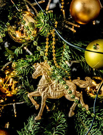 beautiful big Christmas tree decorated with balls and toys holiday christmas mood gifts with ribbons.の写真素材