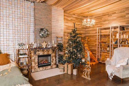 Christmas and New Year decorated interior ,cozy living roomの写真素材