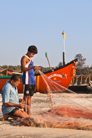 Indian fisherman and his sonのeditorial素材