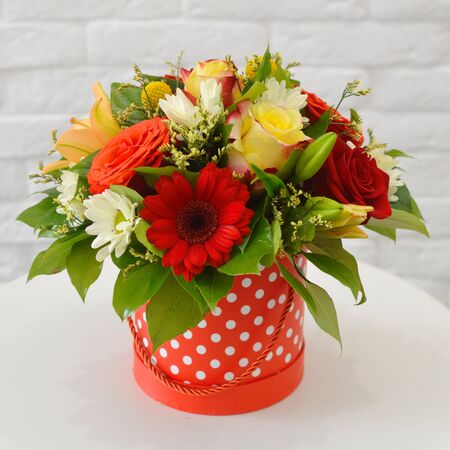 floral floral arrangement in a hat boxの写真素材