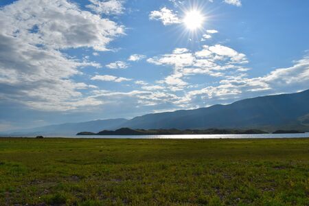Tremendous picturesque landscape with mountains, emerald greens and stones. Summer vacation in most...