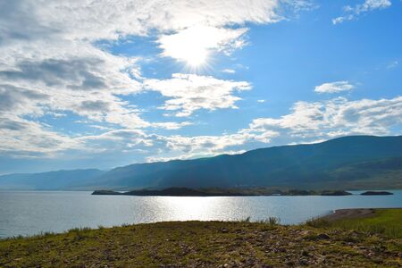 Tremendous picturesque landscape with mountains, emerald greens and stones. Summer vacation in most...