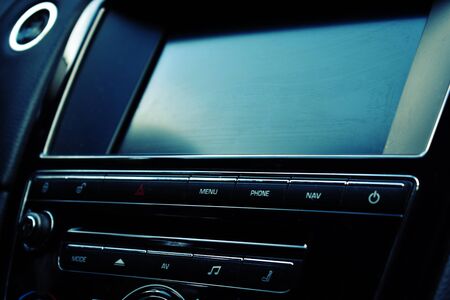 Black shiny details in a car. Auto interior design.