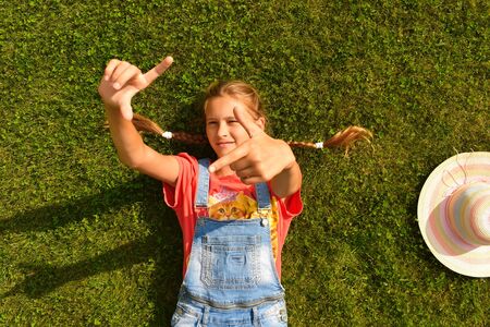 Portrait of a cute teen girl outdoor summer.の写真素材