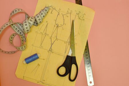 The concept of cutting and sewing. Female needlework. Atelier and clothing modeling.の写真素材