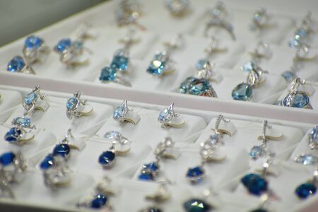 Dear women's jewelry and accessories. Earrings with blue topaz.の写真素材