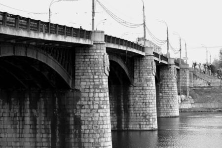 Water cityscape with a gray bridge.の写真素材