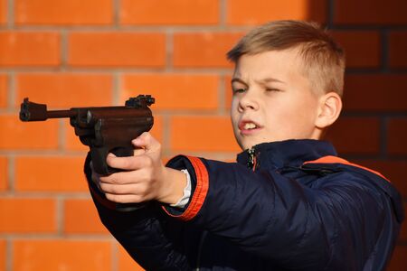 Children's aggression. Weapons in child. Danger of storing weapons at home.