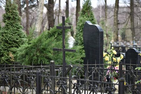 Gravestones and funeral posts. Christian Russian cemetery.の写真素材