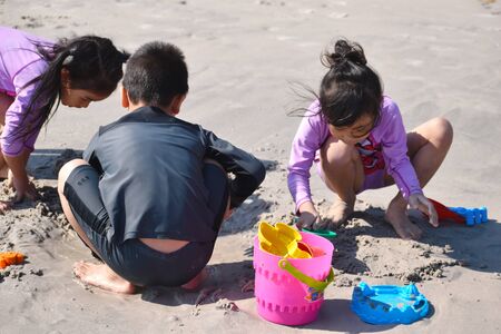 Child on beach with toys. The holiday resort with the baby.のeditorial素材