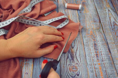 Sewing background. Crafts hobby income. Threads and fabric.
