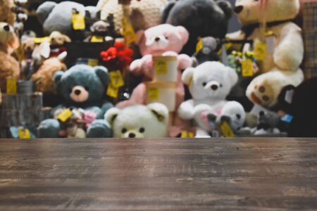 a lot of soft toys in the shop. showcase with toysの写真素材