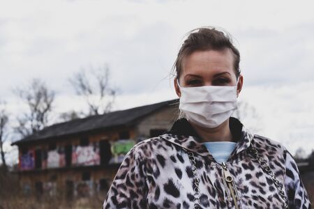 Girl infected with viruses. Take care of yourself. Stay at homeの写真素材