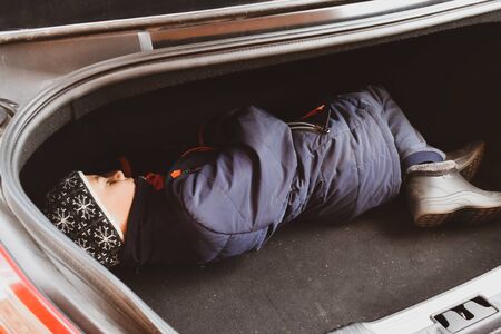 stealing children. The boy prisoner in the car. Danger and kidsの写真素材