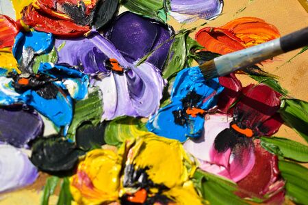 Drawing by Acrylics on the nature. Brushes and paints are art.