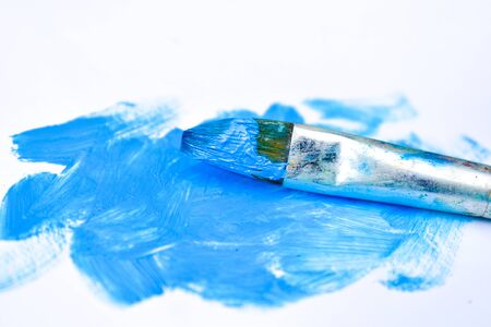 Blue oil paint on a brush. Art Drawing hobby.の写真素材