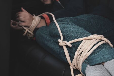 Kidnapped boy in the car. Related children's hands. stealing peopleの写真素材