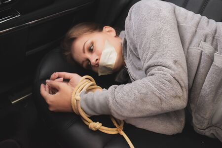 theft people. Kidnapping beautiful women. Slavery and captivity. tape on mouth