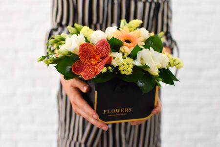 flowers for mother's day and women's day. Flower arrangement in a boxの写真素材
