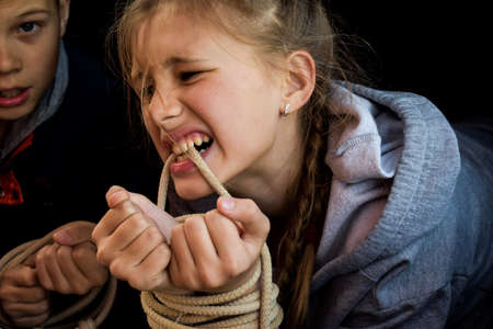 crimes with children. Victims of children in trunk of car. Illegal imprisonmentの写真素材