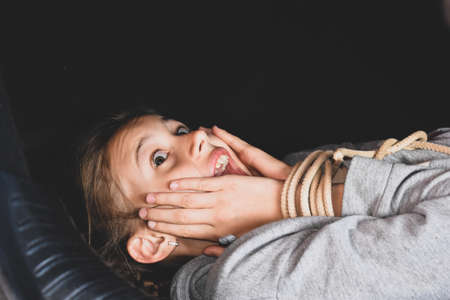 social problem of loss and sale of children. Violence with childrenの写真素材