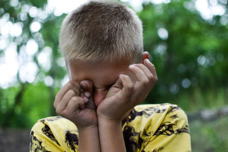child bullying. humiliation of teenager. Boy crying outdor. Childhood aggression and cruelty. child...