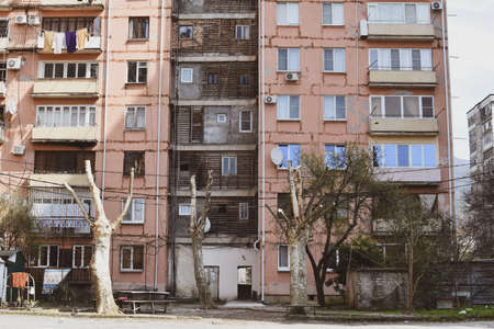 old ancient Soviet high-rise buildings. Russian apartment buildings. a quarter of poor beggar slumsのeditorial素材