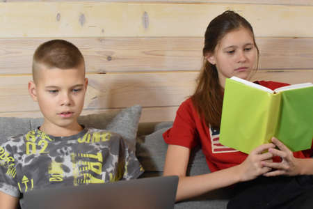 children's home schooling. happy children learn remotely at home
