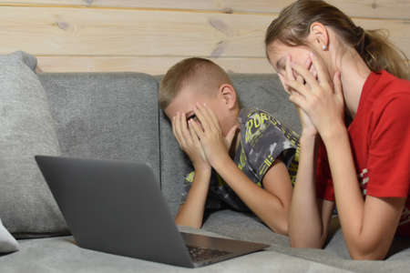 children's home schooling. happy children learn remotely at home