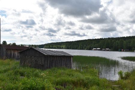 picturesque natural park with water. lake in the national natural park. resting place in the forestの写真素材