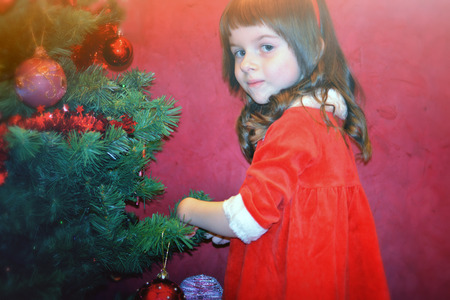 decorating a christmas treeの写真素材