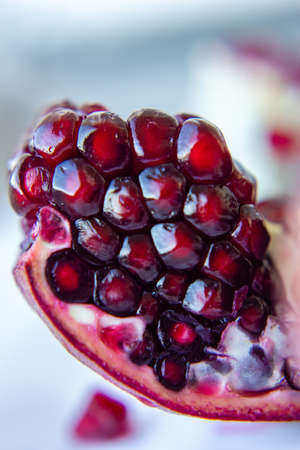 Pomegranate seeds background close upの写真素材