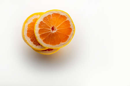 Grapefruit and grapefruit half isolated on white background. Pink,orange Fresh grapefruit citrus fruit, slice with zestの写真素材