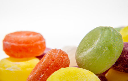 colorful sweet flavored boiled sweets, candies, Candy on white, black background, hard candyの写真素材