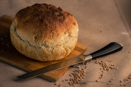 Fresh baked bread, Homemade sourdough Close up shot of bread and sackcloth, Loaves Traditional Cut a...