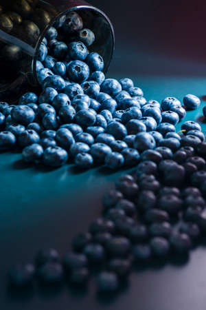 Close-Up Fresh Blueberries blueberry BowlTable Freshly picked glass bowl. Juicy and fresh blueberries Bilberry dark food Background. antioxidant. concept healthy eating nutrition fruitの写真素材