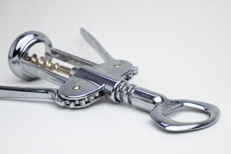 shiny metal wine bottle openers on a white background corkscrew.の写真素材