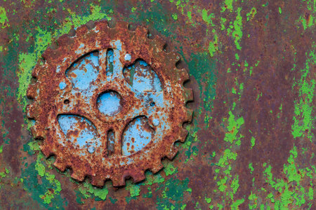OLD METAL GATE GREEN BLUE PAINT MECHANISM CIRCLE RUSTYの写真素材