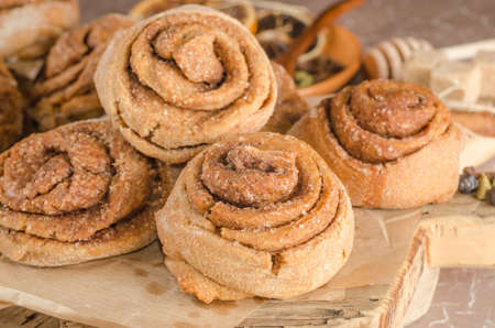 A step-by-step recipe for sweet rose cinnamon rolls. Step 15 - close-up baked cinnamon rollsの写真素材