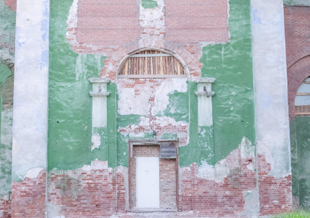 Dilapidated walls of an old abandoned temple building, destroyed by time