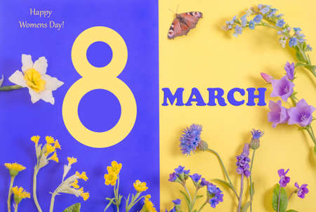 Creative card background with 8 march, from flowers on a yellow-blue background, international women's dayの写真素材