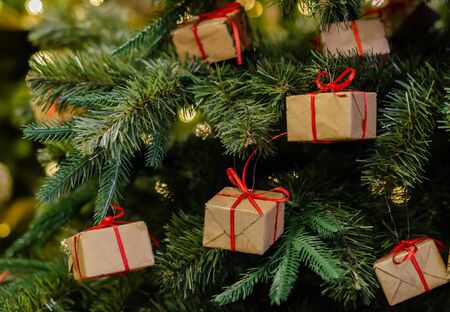 beautiful holiday tinsel for Christmas or New Year background with green fir, closeupの写真素材