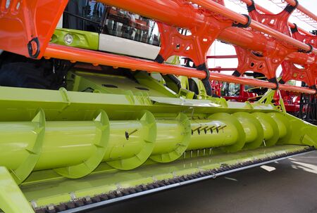 Bright colorful equipment for harvesting grain crops, machinery for the production of agricultural...