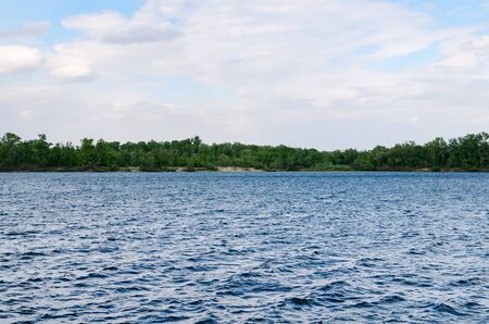 waves on the Kanevsky reservoir, enjoy on a cloudy day, beautiful view of the reservoir, Ukraineの写真素材