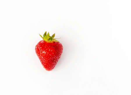 red strawberry, ripe juicy berry on a white background, close upの写真素材