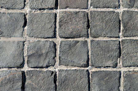 masonry background, fences with stone gravel close up