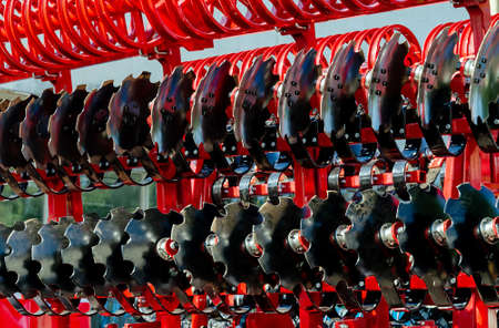 agricultural machine for sowing, preparing and cultivating soil for farmers, close upの写真素材