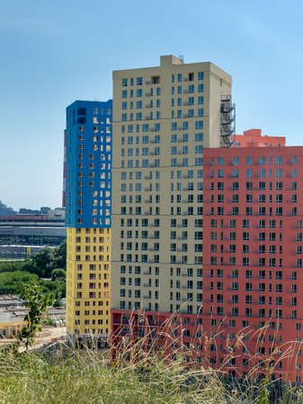 View of new residential high-rise buildings in bright colors. Newest residential complexes. Ukraine,...