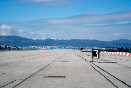 Gibraltar airport runway with mountains on background.の写真素材